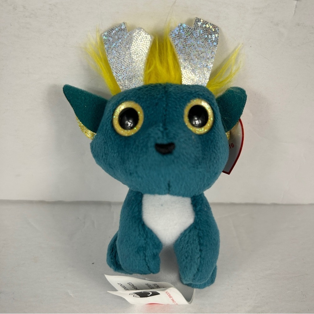 NWT Ty Teal Plush Toy with Silver and Yellow Accents